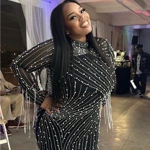 Pearl and Rhinestone dress fits amazing, size XXL it has a lot of stretch.